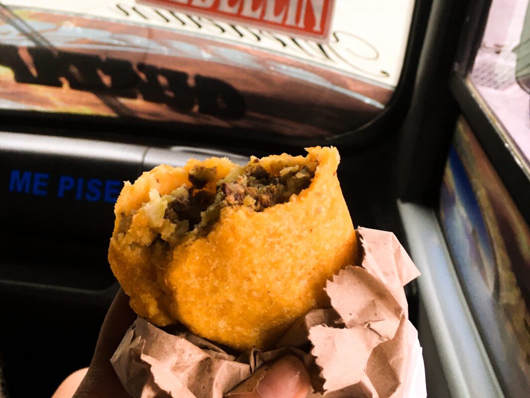 Eating empanadas on the bus ride form Medellin to Guatape